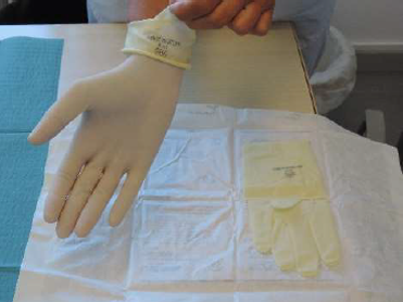 Colocación de guantes estériles